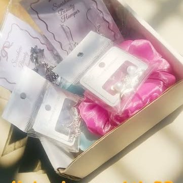 Box with pink satin scrunchie and earring cards